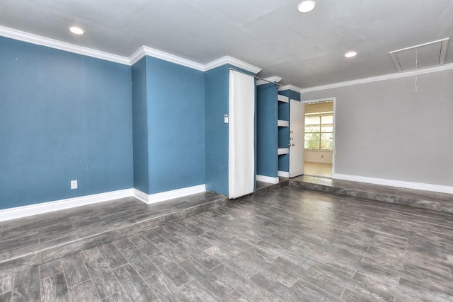803 Easy Day Cv, Austin, TX 78745 - spare room featuring attic access, crown molding, wood finished floors, and recessed lighting