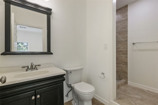 1708 Shag Bark Trl, Austin, TX 78758 - bathroom featuring vanity and a tile shower