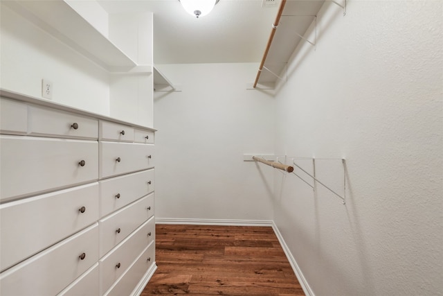 1708 Shag Bark Trl, Austin, TX 78758 - spacious closet featuring wood finished floors