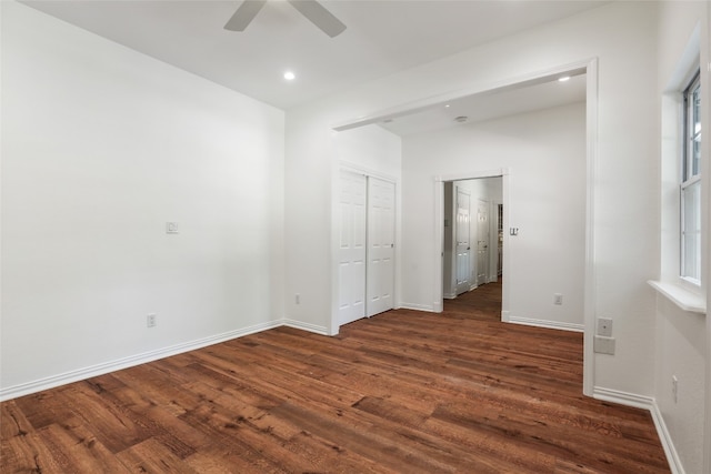 1708 Shag Bark Trl, Austin, TX 78758 - unfurnished bedroom with dark wood-style flooring, recessed lighting, a ceiling fan, and a closet