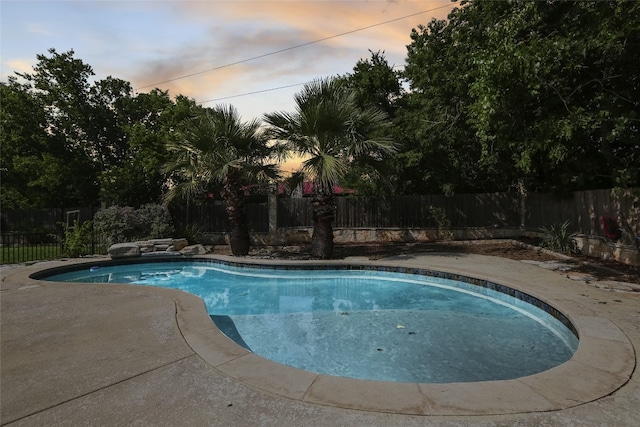 1708 Shag Bark Trl, Austin, TX 78758 - pool at dusk with a fenced backyard