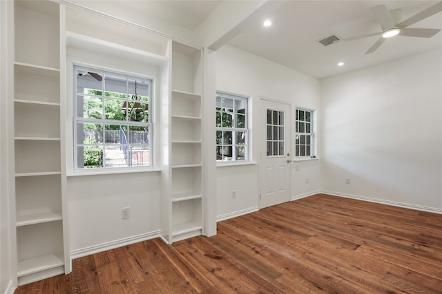 1708 Shag Bark Trl, Austin, TX 78758 - spare room with a ceiling fan, wood finished floors, and recessed lighting