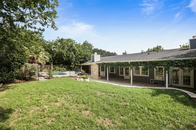 1708 Shag Bark Trl, Austin, TX 78758 - view of yard with french doors and a patio