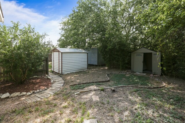 1708 Shag Bark Trl, Austin, TX 78758 - view of yard with a storage shed