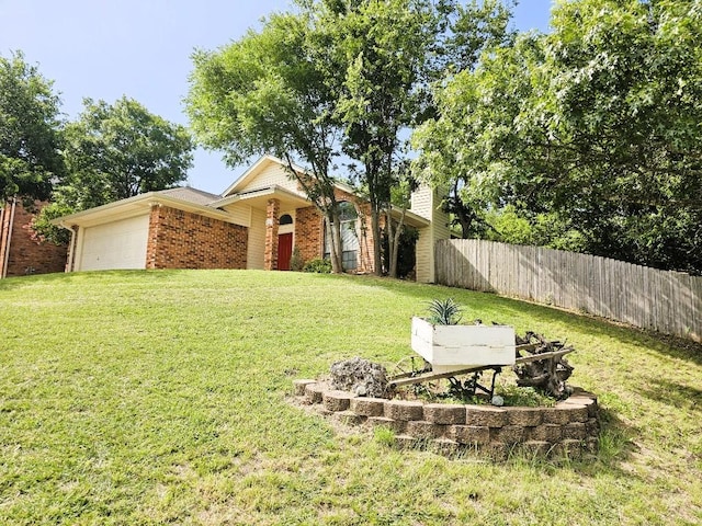 1202 Bowen Ave, Copperas Cove, TX 76522 - view of front of home with brick siding and an attached garage