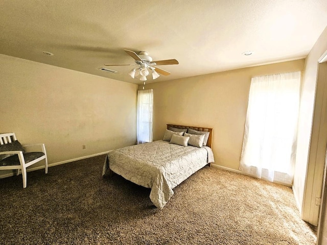 1202 Bowen Ave, Copperas Cove, TX 76522 - carpeted bedroom with ceiling fan and baseboards