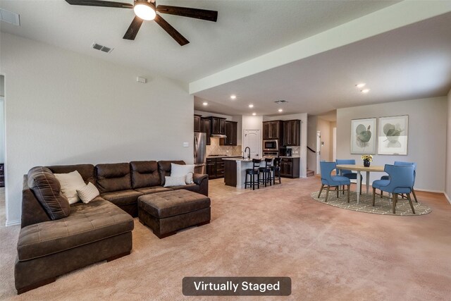 1624 Stone House Dr, New Braunfels, TX 78132 - living room with a ceiling fan, recessed lighting, and light carpet