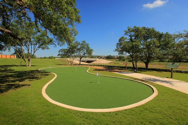 1624 Stone House Dr, New Braunfels, TX 78132 - view of community featuring an area to practice putting and a yard