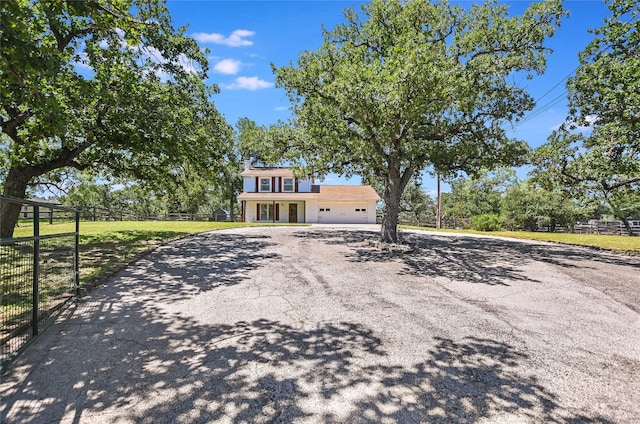 3112 Oak Ridge Dr, Horseshoe Bay, TX 78657 - view of front of property featuring driveway and an attached garage