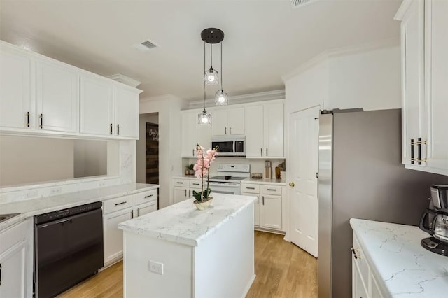 1016 Thackeray Ln, Pflugerville, TX 78660 - kitchen featuring white appliances, white cabinets, light wood-style floors, and ornamental molding