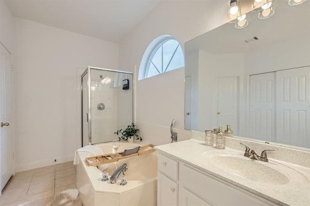1016 Thackeray Ln, Pflugerville, TX 78660 - bathroom featuring a bath, a shower stall, vanity, and tile patterned floors