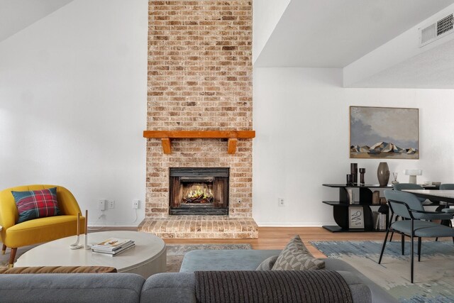 9611 Meadowheath Dr, Austin, TX 78729 - living area with wood finished floors and a fireplace
