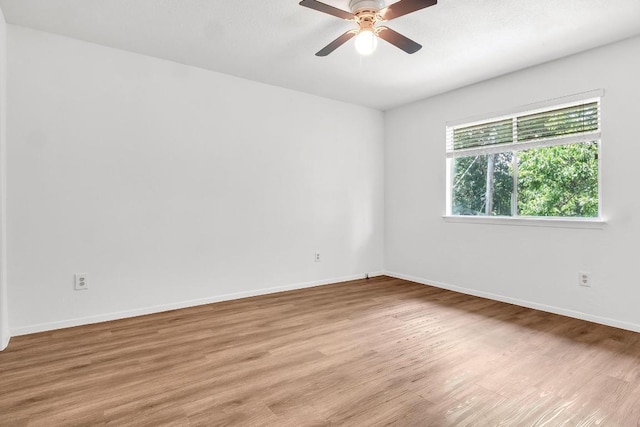 9611 Meadowheath Dr, Austin, TX 78729 - empty room with light wood-type flooring and a ceiling fan