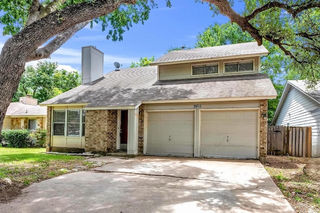 9611 Meadowheath Dr, Austin, TX 78729 - view of front facade with brick siding, driveway, a chimney, and a shingled roof