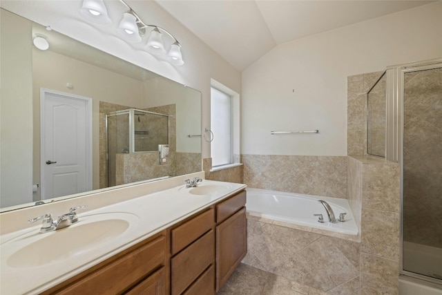 4204 Pasada Ln, Round Rock, TX 78681 - full bath with a stall shower, a bath, lofted ceiling, and double vanity