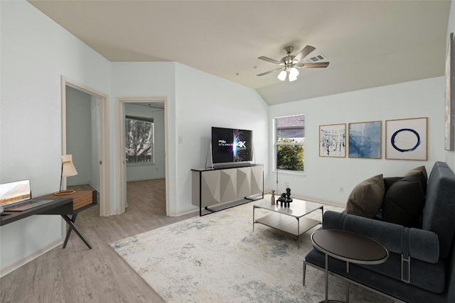 4204 Pasada Ln, Round Rock, TX 78681 - living area featuring wood finished floors, ceiling fan, and lofted ceiling