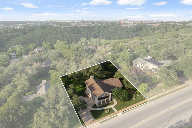 5210 Rain Creek Pkwy, Austin, TX 78759 - aerial view of property and surrounding area featuring a heavily wooded area and property boundaries highlighted