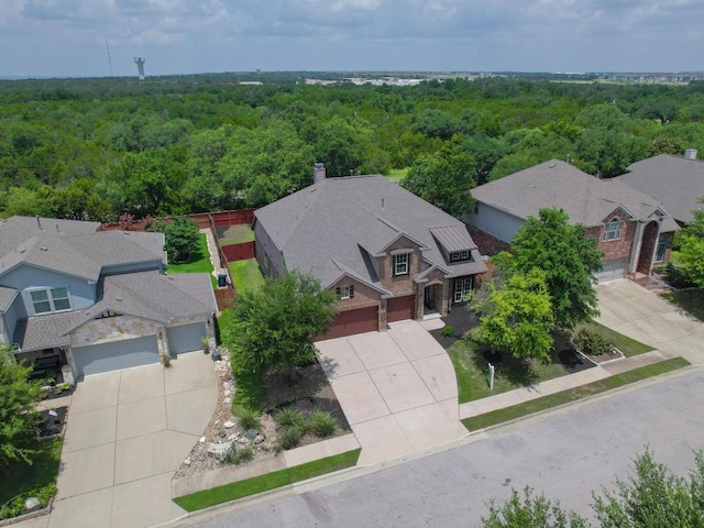 112 Florenz Ln, Georgetown, TX 78628 - aerial perspective of suburban area with a forest