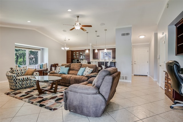 100 Bay Point Dr Unit 13, Horseshoe Bay, TX 78657 - living area featuring ceiling fan, light tile patterned flooring, vaulted ceiling, a chandelier, and crown molding
