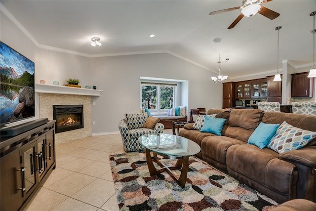 100 Bay Point Dr Unit 13, Horseshoe Bay, TX 78657 - living area with light tile patterned floors, lofted ceiling, a ceiling fan, a chandelier, and a tiled fireplace