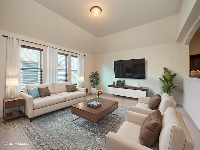 22617 Fountaingrass Ln, Lago Vista, TX 78645 - living room featuring arched walkways and a towering ceiling