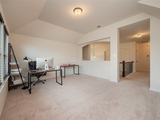 22617 Fountaingrass Ln, Lago Vista, TX 78645 - carpeted home office featuring lofted ceiling and baseboards