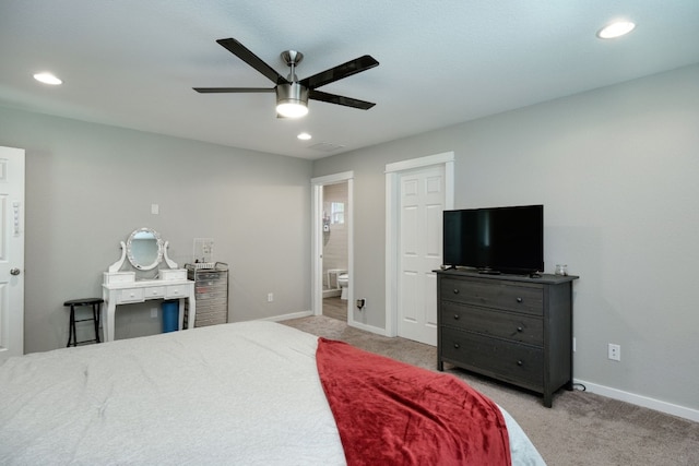 125 Hawea Ln, Bastrop, TX 78602 - bedroom featuring light carpet, recessed lighting, connected bathroom, and a ceiling fan
