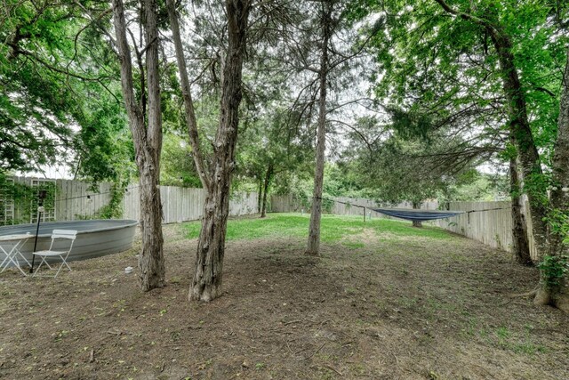 125 Hawea Ln, Bastrop, TX 78602 - view of fenced backyard