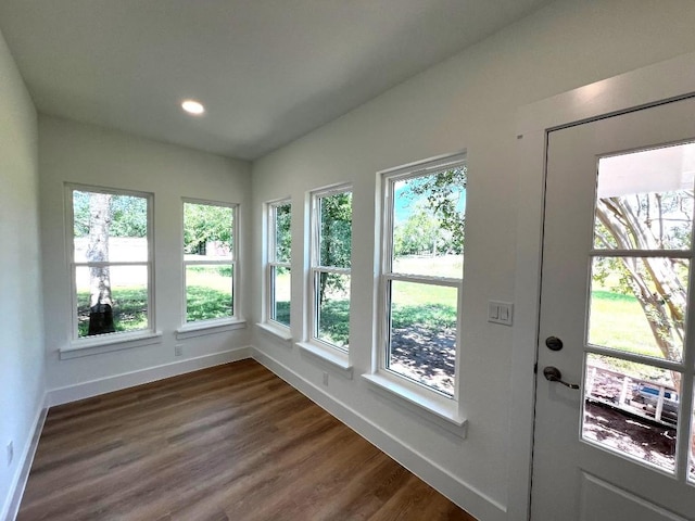 1105 Carroll Ln, La Grange, TX 78945 - unfurnished sunroom with plenty of natural light, wood finished floors, and recessed lighting