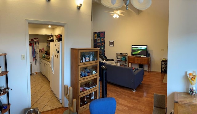 2612 San Pedro St Unit 224, Austin, TX 78705 - living area with ceiling fan and light wood-style flooring
