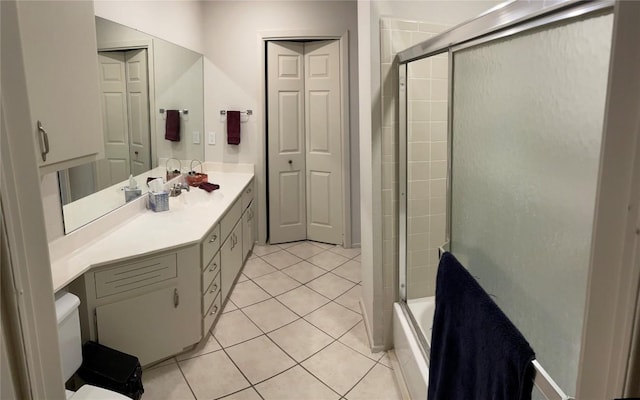 2612 San Pedro St Unit 224, Austin, TX 78705 - bathroom with shower / bath combination with glass door, tile patterned floors, and vanity