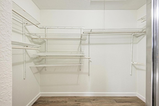 2705 Sabinal Trl, Cedar Park, TX 78613 - spacious closet featuring wood finished floors