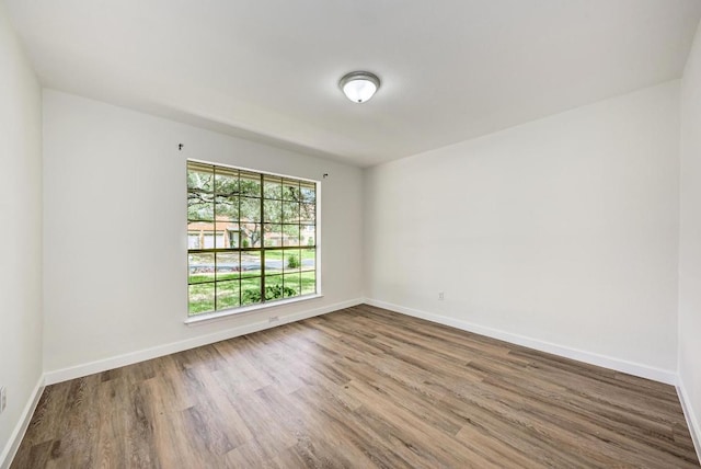 2705 Sabinal Trl, Cedar Park, TX 78613 - unfurnished room with wood finished floors and baseboards