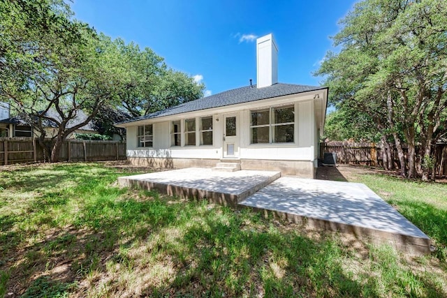 2705 Sabinal Trl, Cedar Park, TX 78613 - rear view of property with a patio area, a fenced backyard, entry steps, and a shingled roof