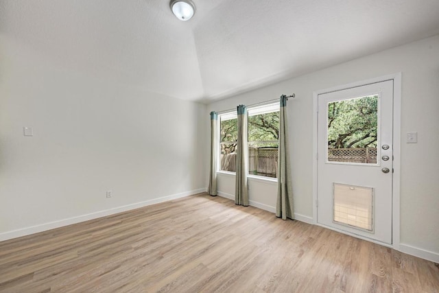 2705 Sabinal Trl, Cedar Park, TX 78613 - unfurnished room featuring light wood-type flooring and lofted ceiling