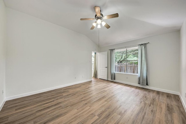 2705 Sabinal Trl, Cedar Park, TX 78613 - spare room with vaulted ceiling, wood finished floors, and ceiling fan