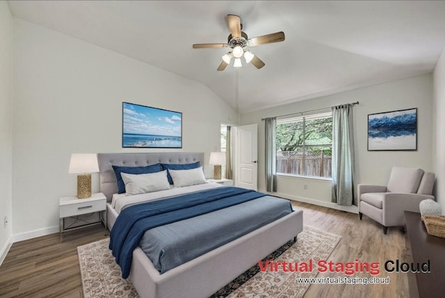 2705 Sabinal Trl, Cedar Park, TX 78613 - bedroom featuring wood finished floors, vaulted ceiling, and a ceiling fan