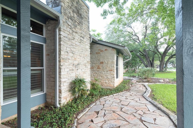 3801 Oak Creek Dr, Austin, TX 78727 - view of side of property with stone siding