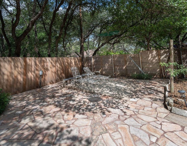 3801 Oak Creek Dr, Austin, TX 78727 - fenced backyard with a patio area