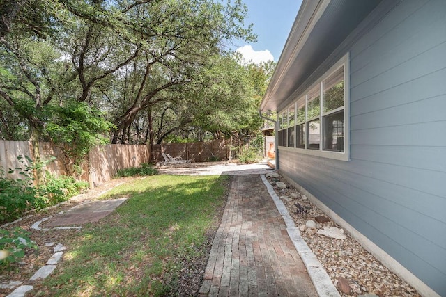 3801 Oak Creek Dr, Austin, TX 78727 - fenced backyard featuring a patio