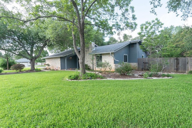 3801 Oak Creek Dr, Austin, TX 78727 - view of front facade with a chimney and brick siding