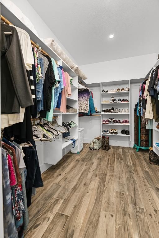 110 Les Ln, Smithville, TX 78957 - walk in closet with wood finished floors
