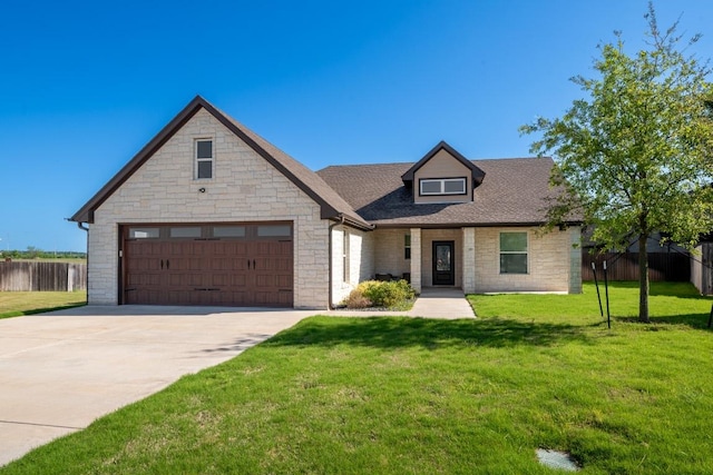 110 Les Ln, Smithville, TX 78957 - view of front of home with stone siding, driveway, and a shingled roof