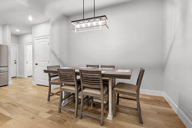 110 Les Ln, Smithville, TX 78957 - dining area featuring a chandelier, recessed lighting, and light wood-type flooring