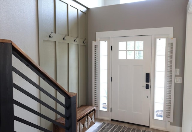 1654 Belvedere Pl, Round Rock, TX 78665 - foyer with stairs and dark wood-type flooring