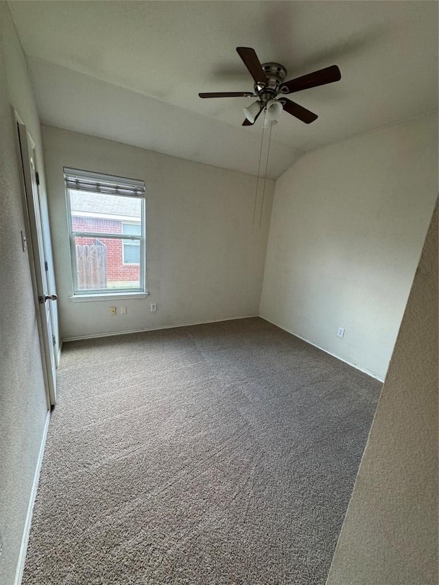 257 Firwood N, Kyle, TX 78640 - carpeted spare room featuring a ceiling fan