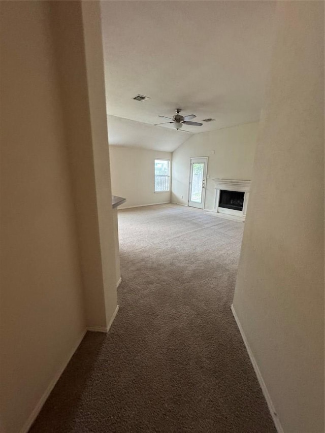 257 Firwood N, Kyle, TX 78640 - corridor with carpet and vaulted ceiling