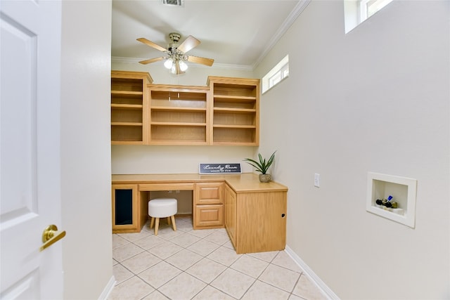 307 Dove Hollow Trl, Georgetown, TX 78633 - unfurnished office with built in desk, light tile patterned floors, a ceiling fan, and ornamental molding