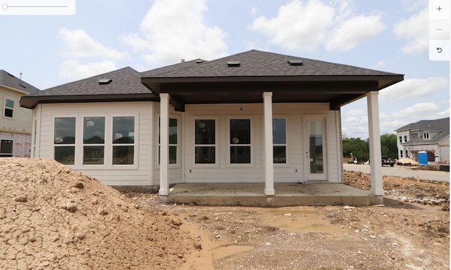 2008 Saco St, Leander, TX 78641 - back of house with roof with shingles and a patio area