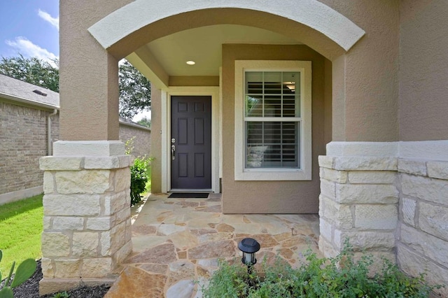 319 Salado Creek Ln, Georgetown, TX 78633 - view of exterior entry featuring stucco siding